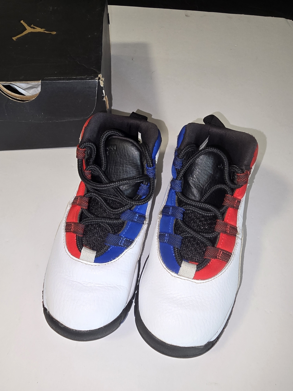 Jordan Kids White Sneakers with Red & Blue Accents